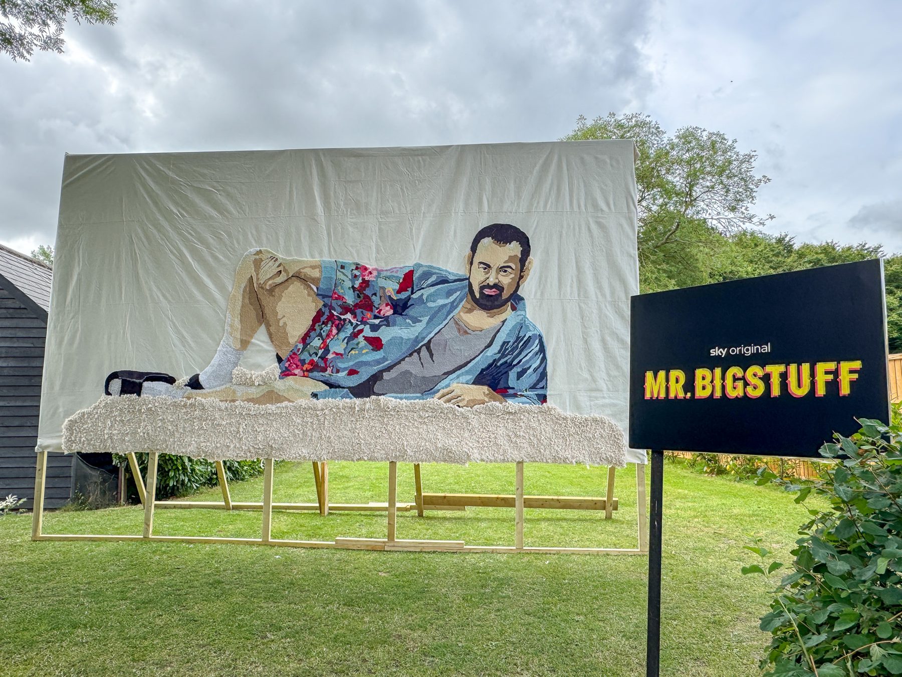 The giant Mr Bigstuff rug installed outdoors